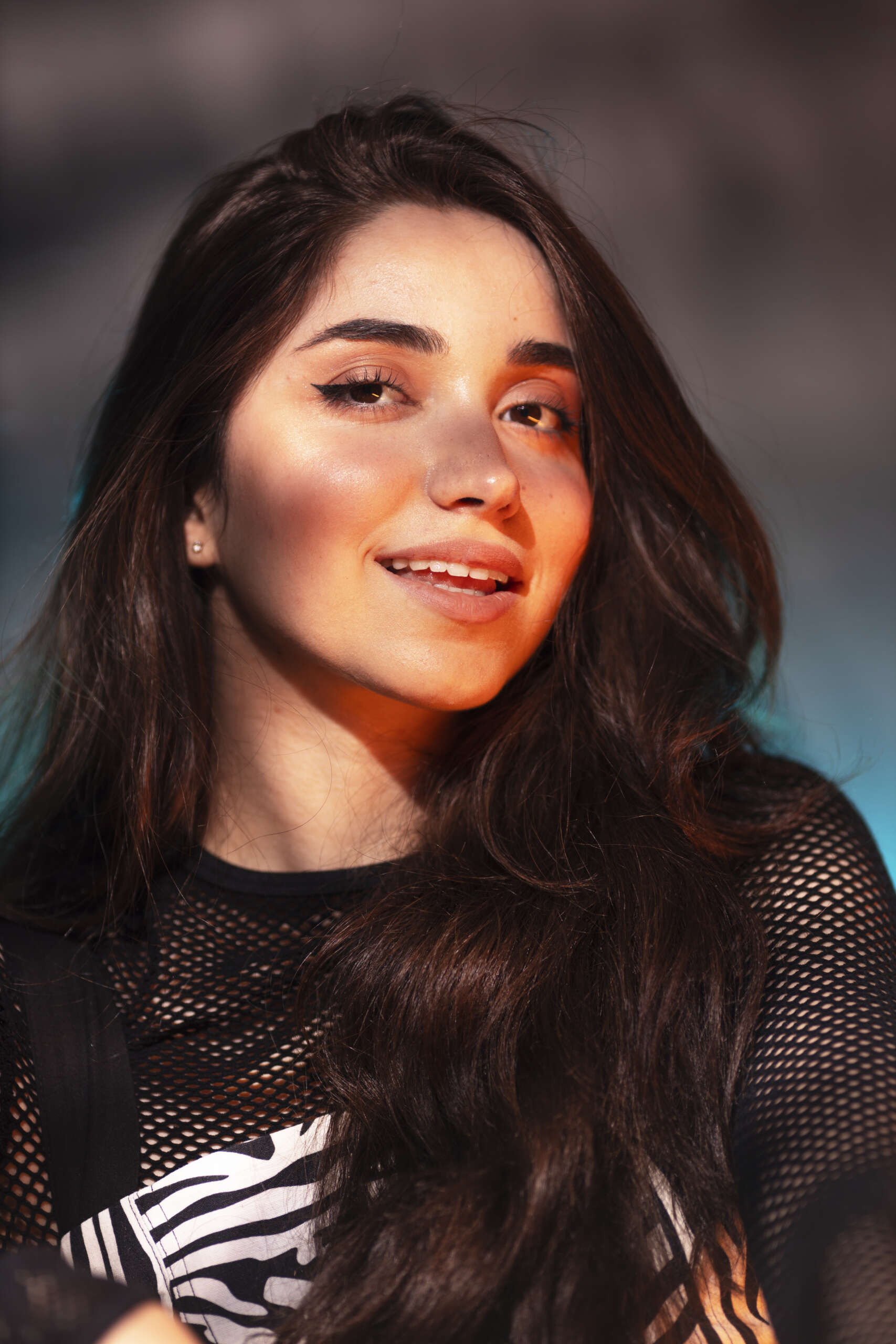 portrait person attending vibrant techno music party